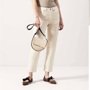 Rothy's Cream and Black Saddle Bag